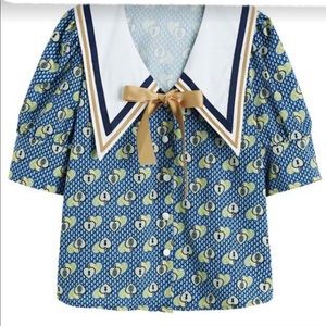 Feminine vintage vibe blouse.